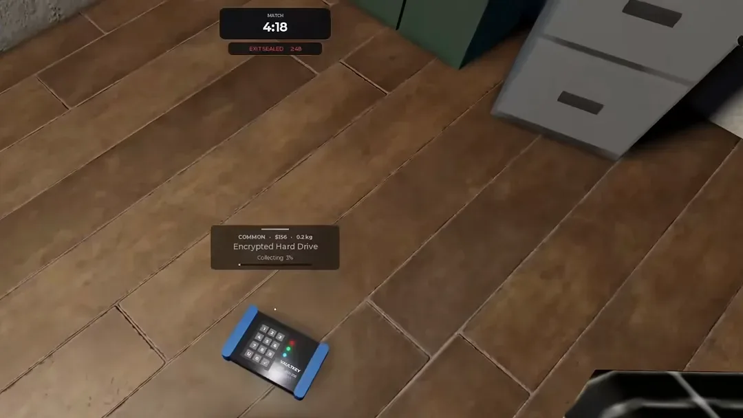 A Common encrypted hard drive worth $156 mid pickup on a Facility floor in Steal Or Die