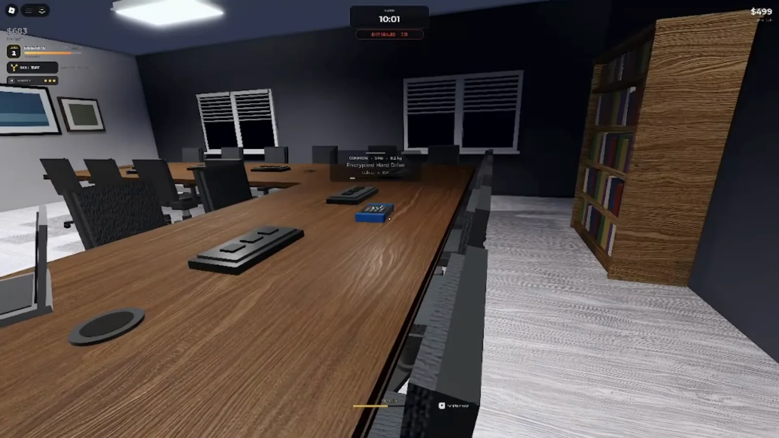 The Office conference room with laptops and devices on a long wooden table in Steal Or Die
