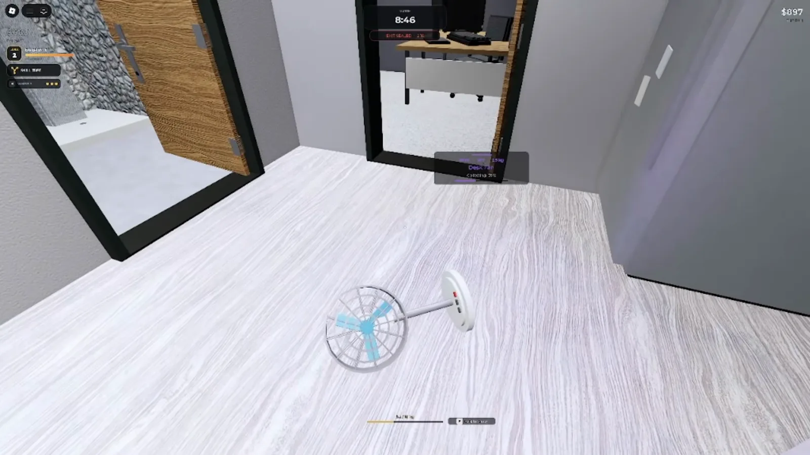 A desk fan being collected in a bright Office corridor in Steal Or Die